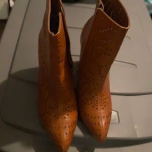 Brand new ankle boots brand is by Carlos